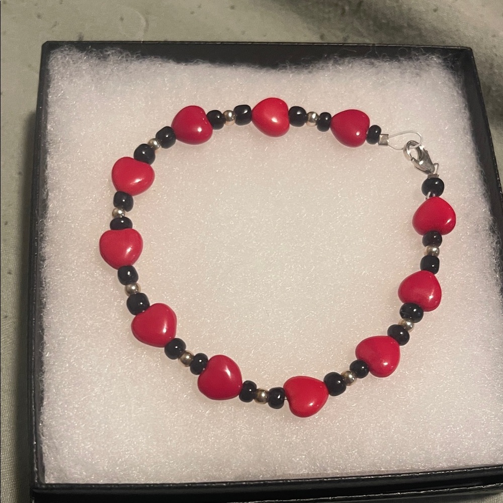 Elegant Red Heart Bracelet with Black Accents